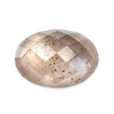 CHAMPAGNE SUNSTONE CHECKER OVAL CAB 14X10MM 4.99 Cts.