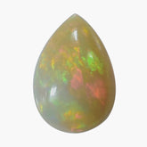 ETHIOPIAN OPAL (YELLOW BASE YELLOW POWER ) (MILKY) PLAIN PEAR CAB 10.00X7.00MM 1.03 Cts.