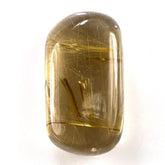 GOLDEN RUTILE QUARTZ PLAIN LENTIL OVAL (RUTILES)(BROWN OILISH) 42.00X23.00MM 151.00 Cts.