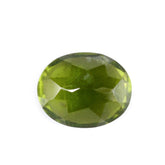 MILKY IDOCRASE CUT OVAL 11X9MM 4.25 Cts.