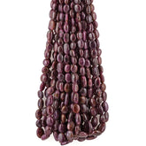 RUBY 9X7-17X10MM PLAIN OVAL TUMBLE 16" LINE