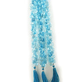 SKY BLUE TOPAZ 11X9MM FACETED DROPS 8" LINE