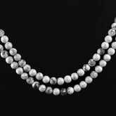 HOWLITE 8MM PLAIN ROUND BALLS 15" PER LINE