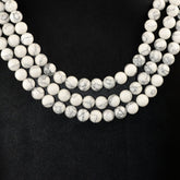 HOWLITE 10MM PLAIN ROUND BALLS 15" PER LINE