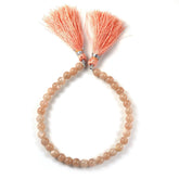 PEACH MOONSTONE 6-6.50MM PLAIN BALLS 8" PER LINE