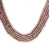 PEACH 4MM COLOR COATED PYRITE FACETED ROUNDEL 13" PER LINE