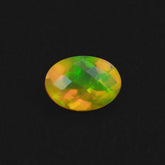 ETHIOPIAN OPAL CHECKER CUT OVAL (YELLOW BASE) (BLUE GREEN SHINE) 7X5MM 0.51 Cts.