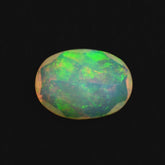 ETHIOPIAN OPAL CUT OVAL 8X6MM (YELLOW BASE) (BLUE GREEN SHINE) 0.75 Cts.