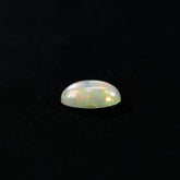 ETHIOPIAN OPAL PLAIN OVAL CAB (OFF WHITE MILKY/VERY LOW MULTI POWER) 6.00X4.00 MM 0.25 CTS