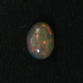ETHIOPIAN OPAL PLAIN OVAL CAB (YELLOW BASE/MULTI POWER) 8.00X6.00 MM 0.71 CTS