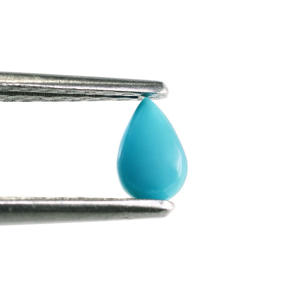 TURQUOISE PEAR CAB 6X4MM 0.35 Cts.