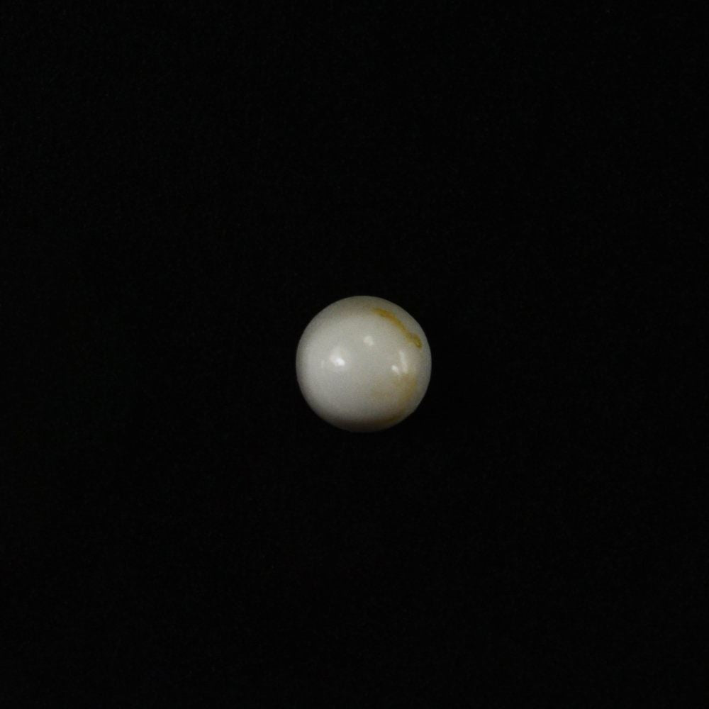 WHITE ONYX ROUND CAB (WITH BROWN SPOTS) 2MM 0.05 Cts.