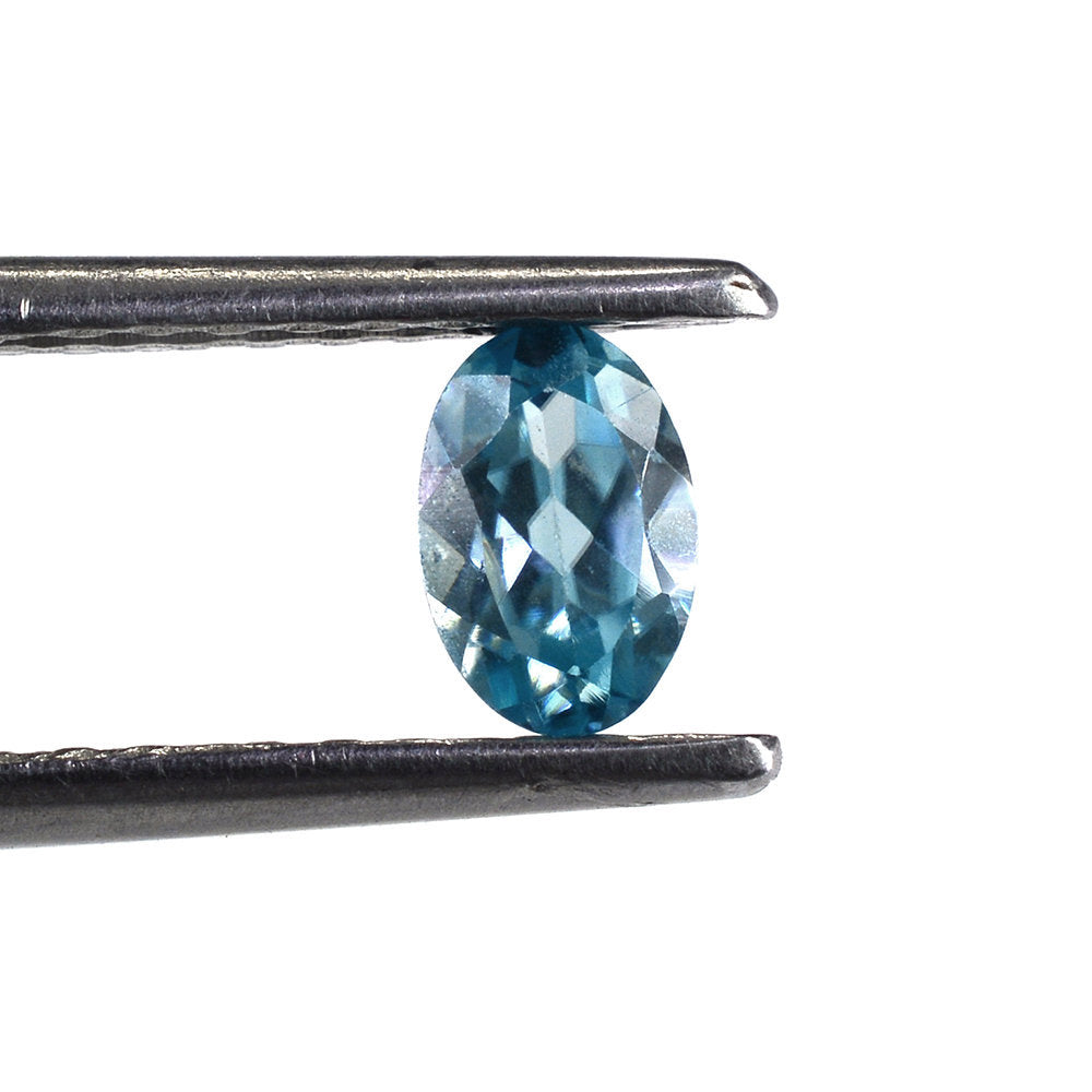 NATURAL BLUE ZIRCON CUT OVAL 6X4MM 0.63 Cts.