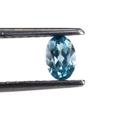 NATURAL BLUE ZIRCON CUT OVAL 6X4MM 0.63 Cts.