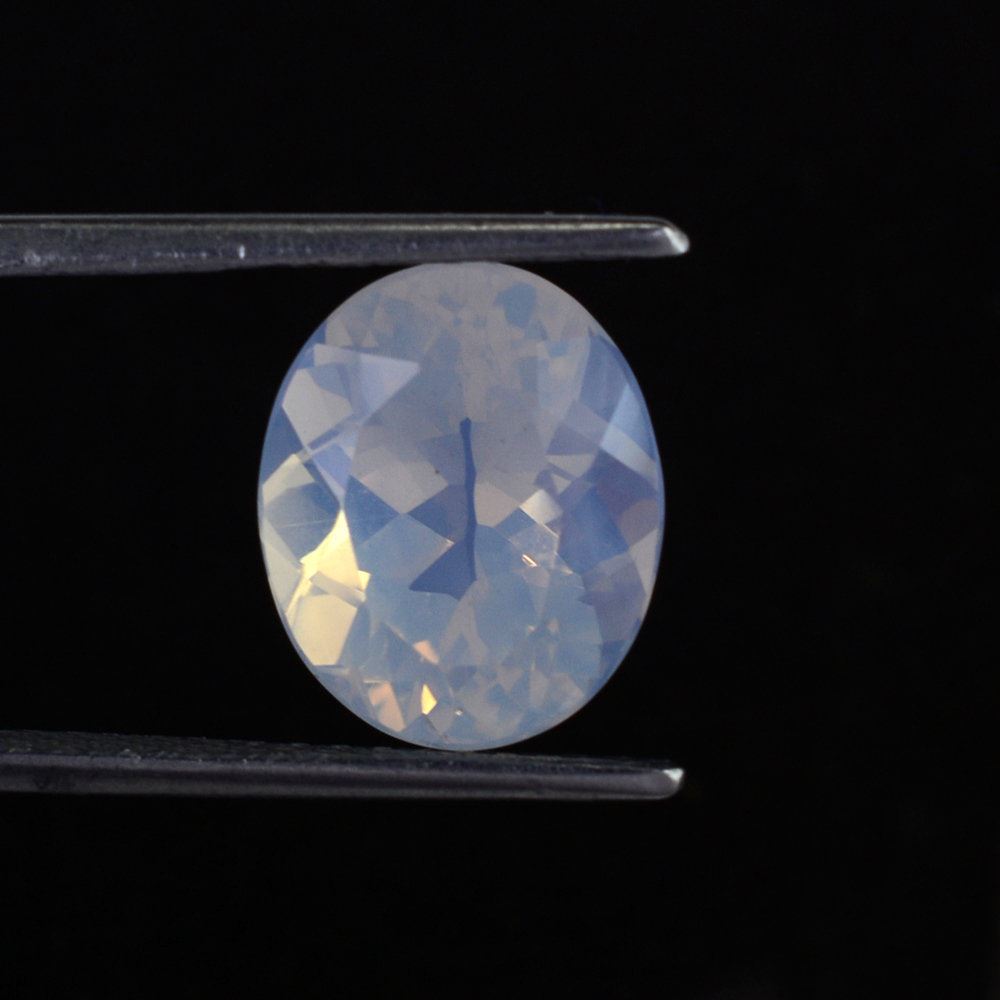 BLUE MOON QUARTZ CUT OVAL 12X10MM 4.78 Cts.
