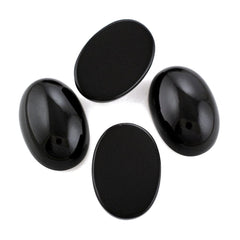 BLACK ONYX OVAL CAB 18X12MM 10.49 Cts.