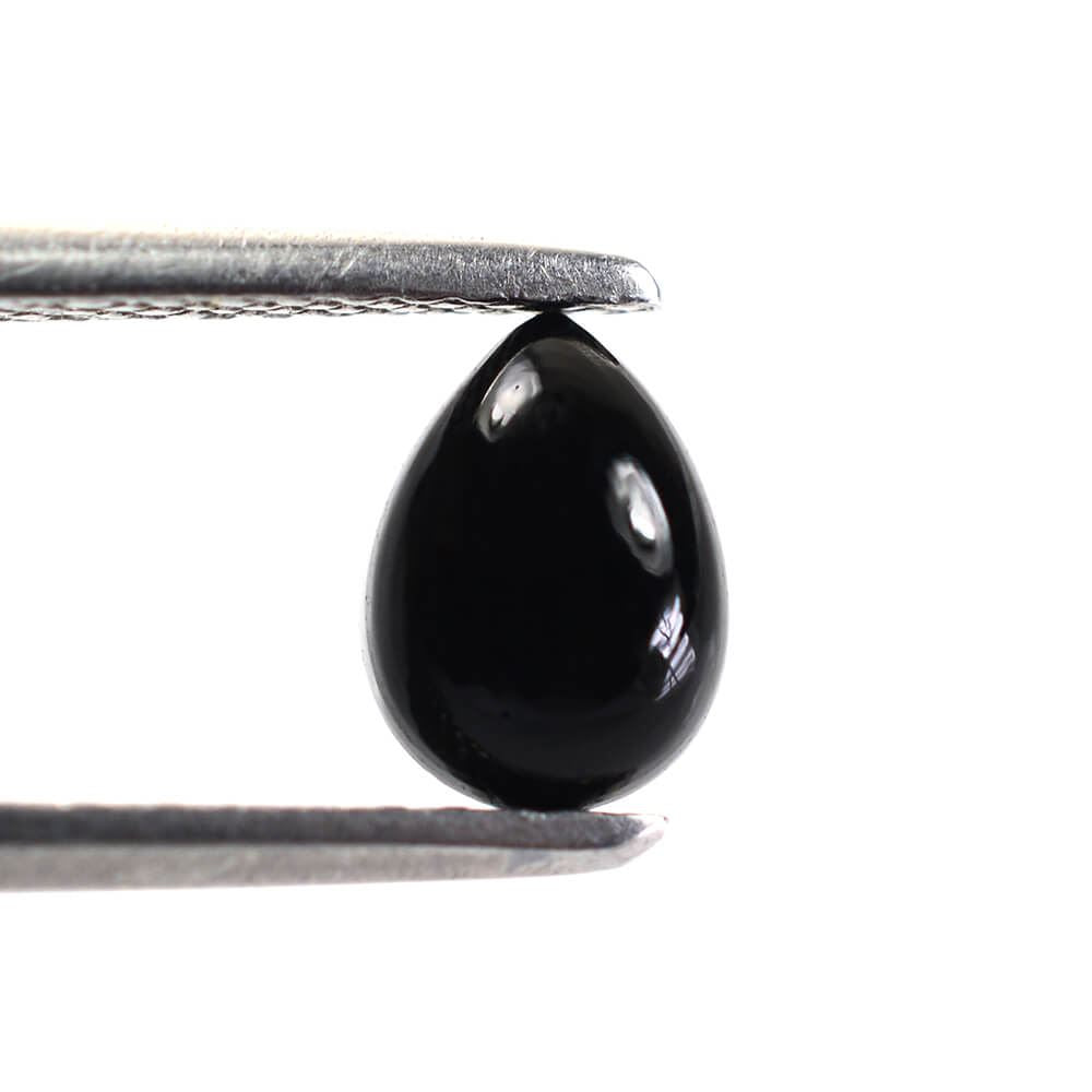 BLACK ONYX PEAR CAB 7X5MM 0.73 Cts.