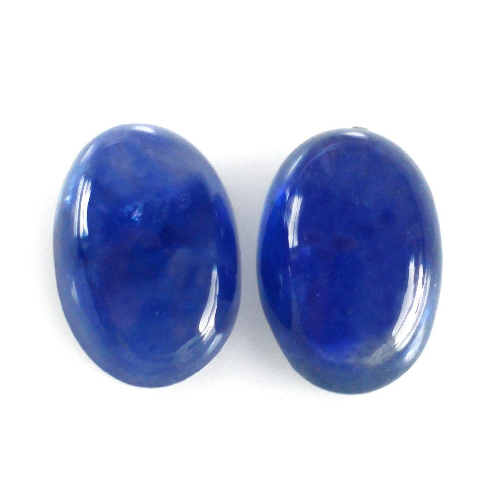 GLASSFILLED BLUE SAPPHIRE OVAL CAB 6X4MM 0.64 Cts.
