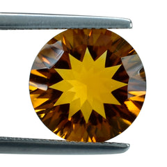 CITRINE (ORANGE) CONCAVE CUT ROUND (DES#45) 12MM 5.15 Cts.