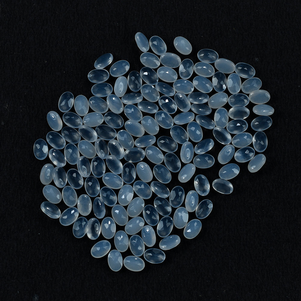 NATURAL CHALCEDONY BUFF TOP OVAL 6X4 MM 0.42 Cts.