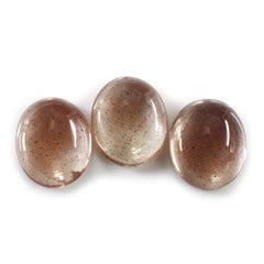 CHAMPAGNE SUNSTONE OVAL CAB 12X10MM 3.73 Cts.