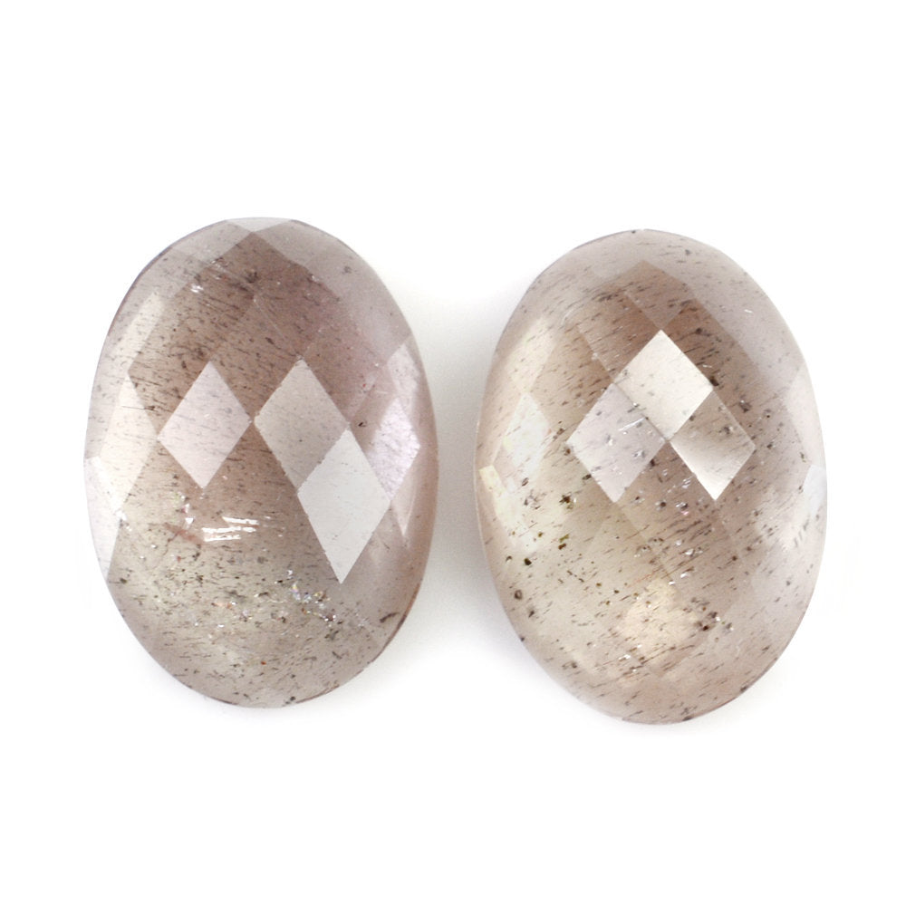 CHAMPAGNE SUNSTONE CHECKER OVAL CAB 14X10MM 4.99 Cts.