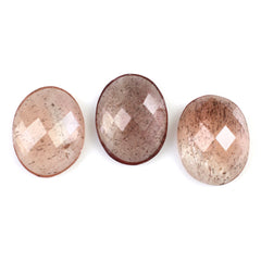 CHAMPAGNE SUNSTONE CHECKER OVAL CAB 10X8MM 2.36 Cts.