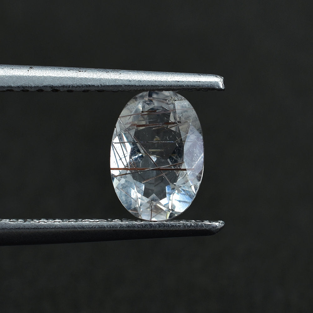 COPPER RUTILE QUARTZ CUT OVAL 7X5MM 0.68 Cts.