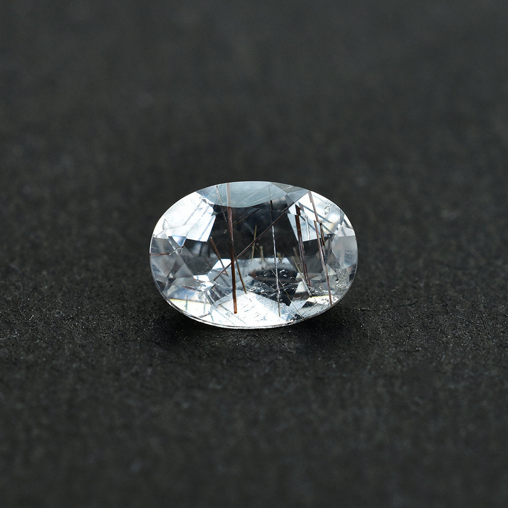 COPPER RUTILE QUARTZ CUT OVAL 7X5MM 0.68 Cts.