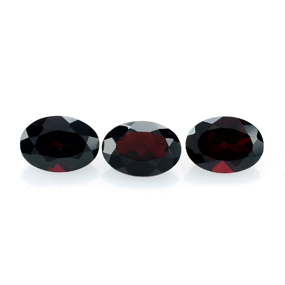 DARK RED GARNET CUT OVAL 7X5MM 1.00 Cts.