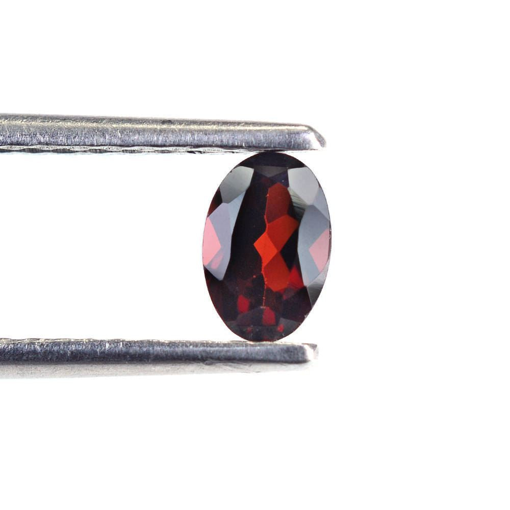 DARK RED GARNET CUT OVAL 6X4MM 0.52 Cts.