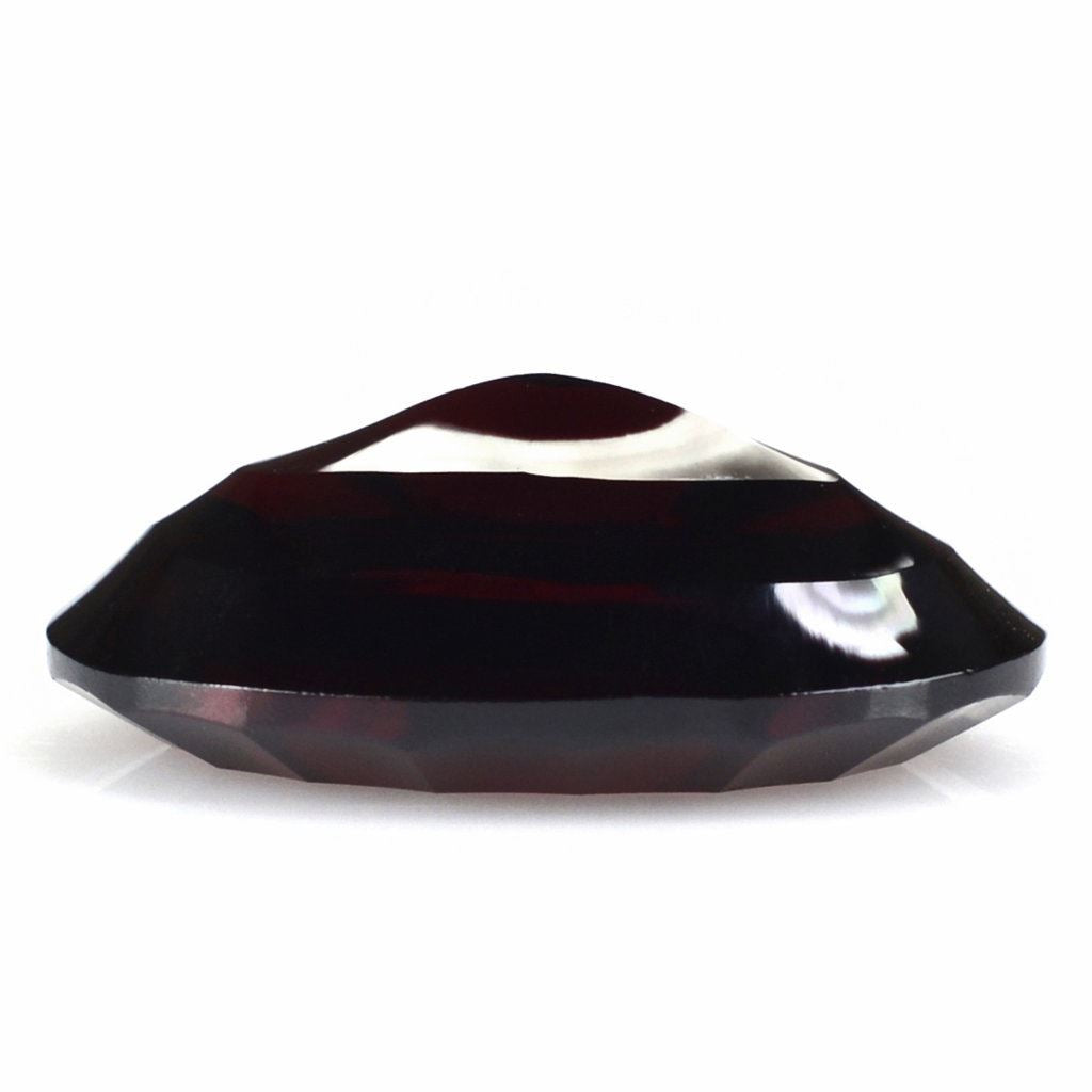 RED GARNET SWIRL CUT OVAL (DES#84) 16X12MM 9.50 Cts.