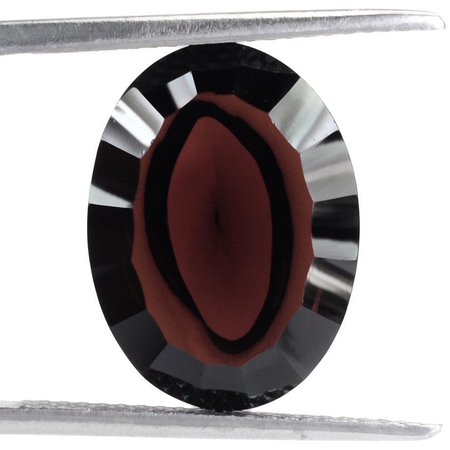 RED GARNET SWIRL CUT OVAL (DES#84) 16X12MM 9.50 Cts.