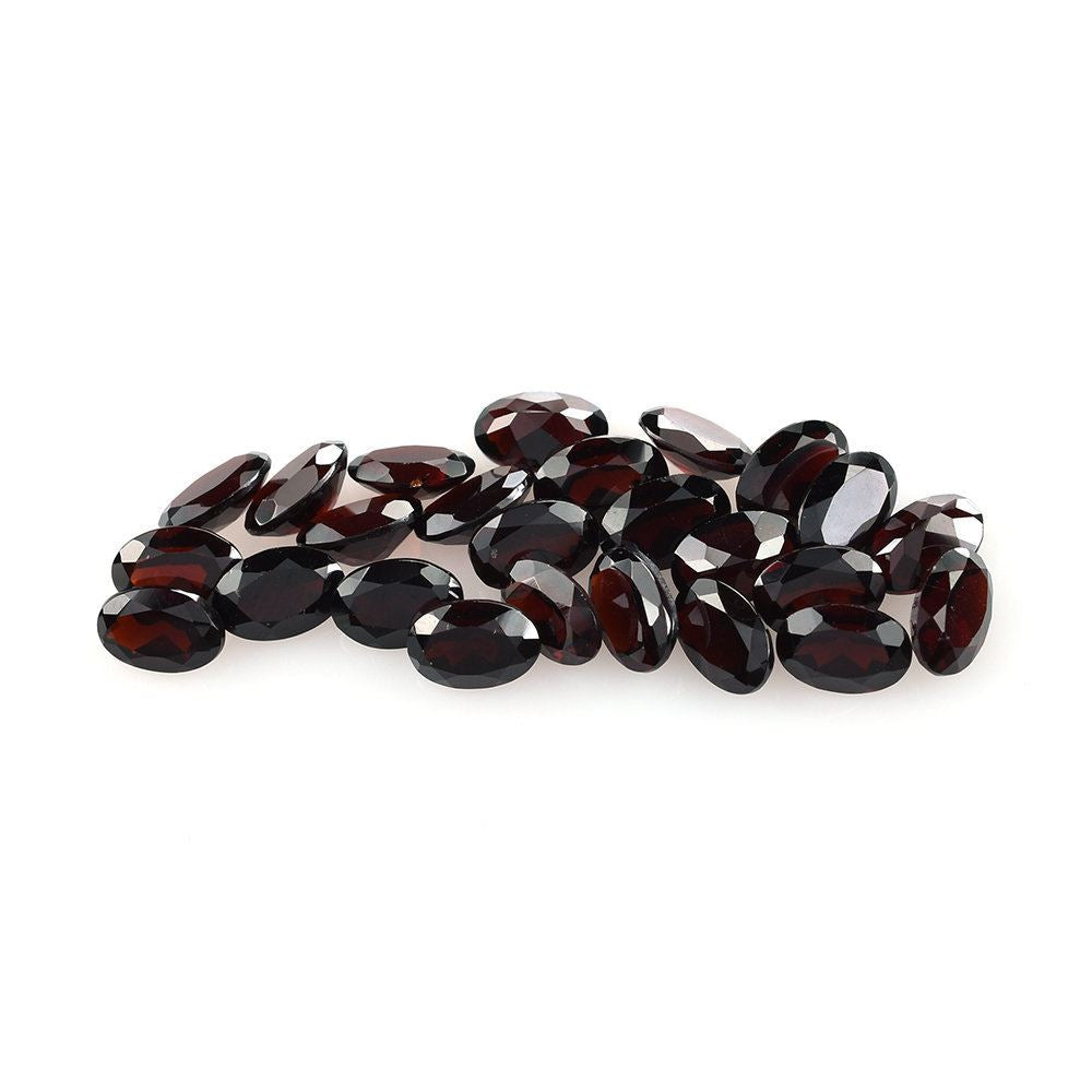 RED GARNET CUT OVAL (DARK/CLEAN) 6X4MM 0.55 Cts.