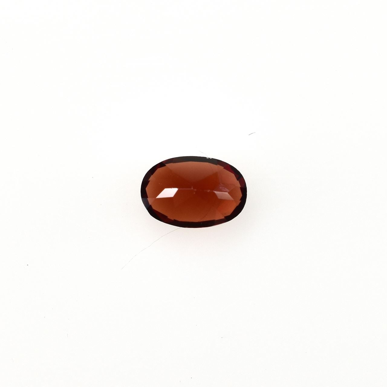 GARNET CUT OVAL (MEDIUM RED)(CLEAN) 6.00X4.00 MM 0.48 Cts.