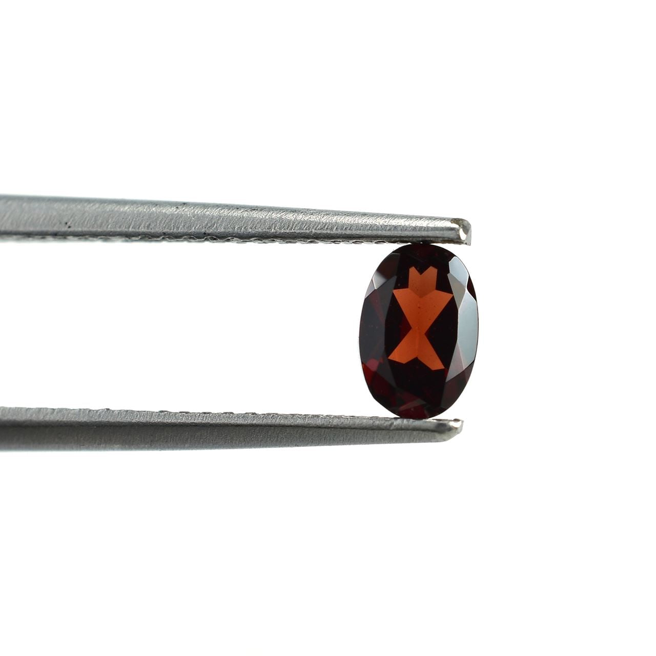 GARNET CUT OVAL (MEDIUM RED)(CLEAN) 6.00X4.00 MM 0.48 Cts.