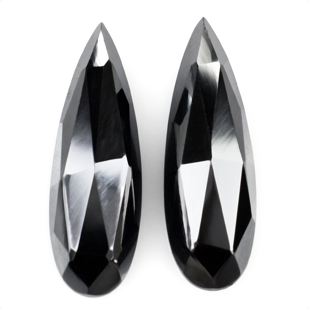 HEMATITE ROSE CUT PEAR CAB 25X8MM 12 Cts.