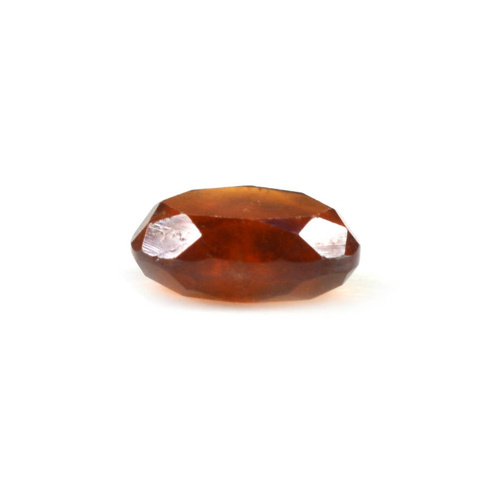 HESSONITE BOTH SIDE TABLE CUT TRILLIONISH 7X6MM 1.29 Cts.