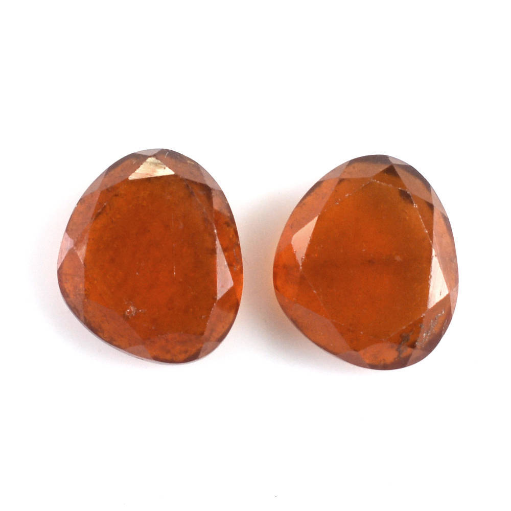 HESSONITE BOTH SIDE TABLE CUT TRILLIONISH 7X6MM 1.29 Cts.