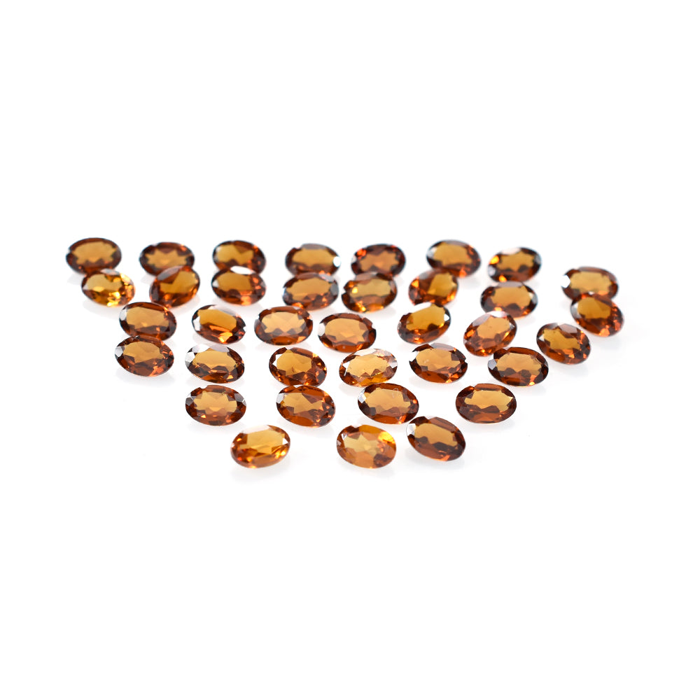 HESSONITE CUT OVAL 6X4MM 0.40 Cts.