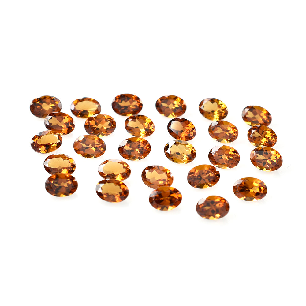 HESSONITE CUT OVAL 7X5MM 0.86 Cts.