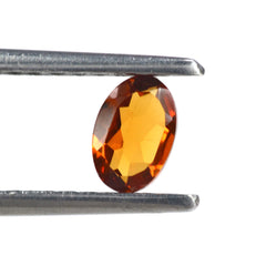 HESSONITE CUT OVAL 6X4MM 0.59 Cts.
