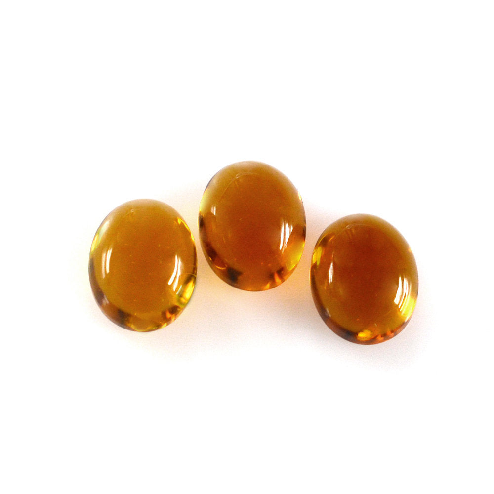 HESSONITE OVAL CAB 5X4MM 0.47 Cts.