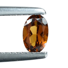 HESSONITE CUT OVAL 6X4MM 0.57 Cts.