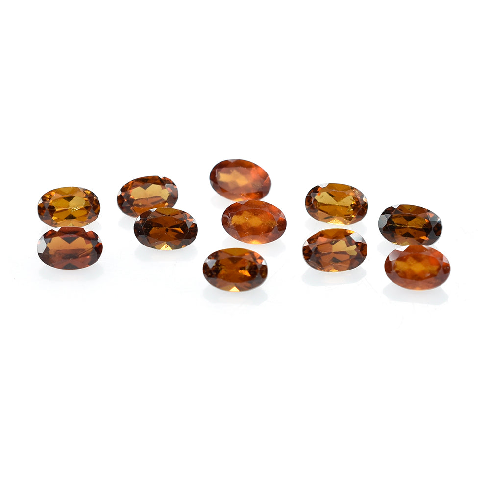 HESSONITE CUT OVAL 6X4MM 0.57 Cts.