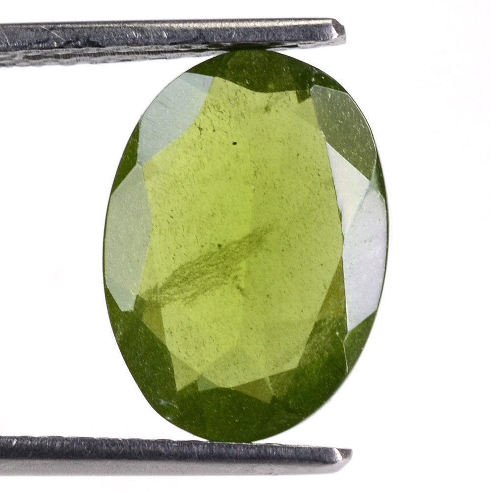 MILKY IDOCRASE CUT OVAL 14X10MM 4.55 Cts.