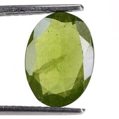 MILKY IDOCRASE CUT OVAL 14X10MM 4.55 Cts.