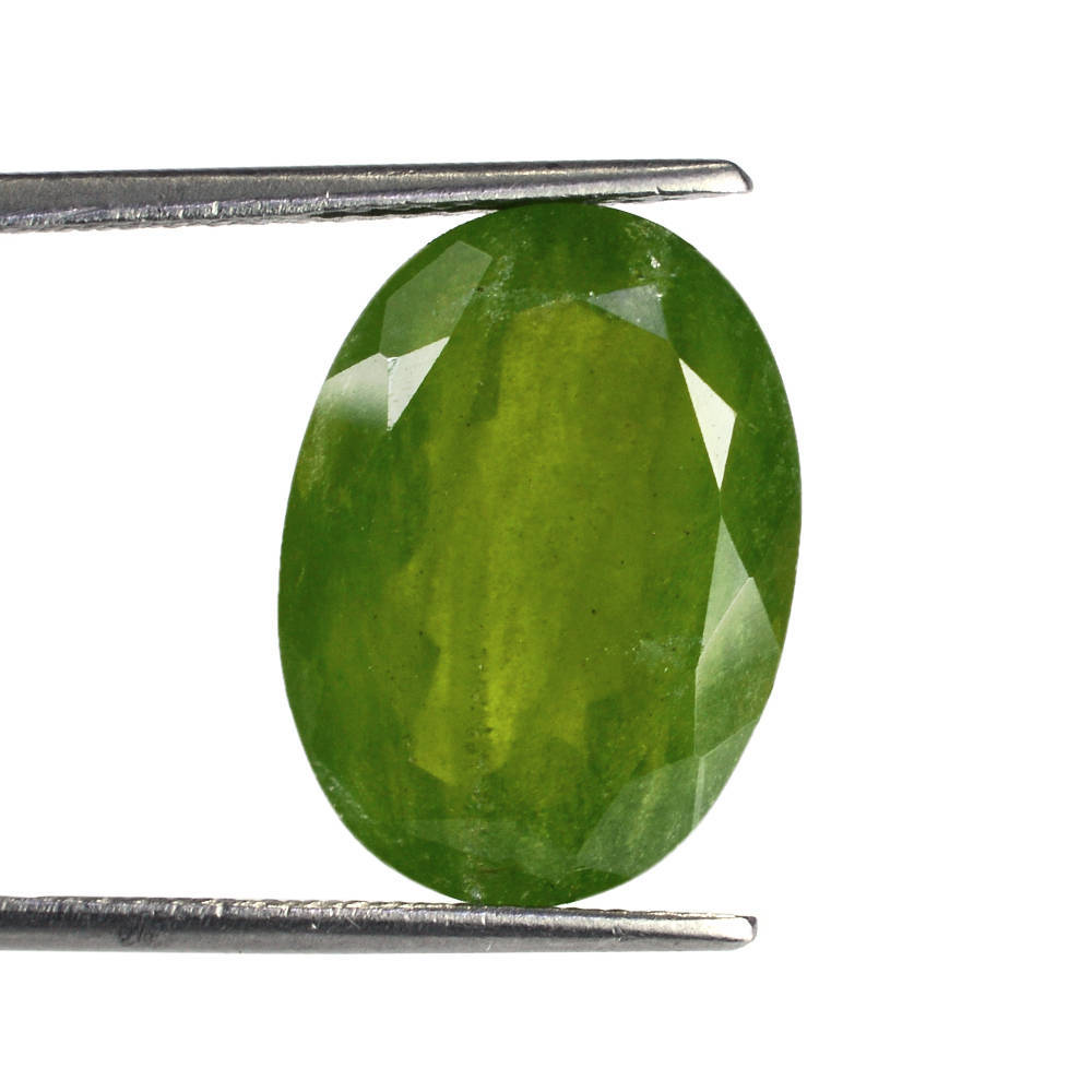 MILKY IDOCRASE CUT OVAL 18X13MM 14.00 Cts.