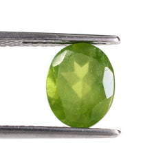 MILKY IDOCRASE CUT OVAL 10X8MM 3.05 Cts.