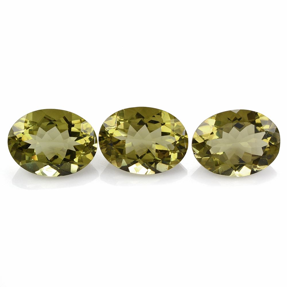 OLIVE QUARTZ CUT OVAL 16X12MM 7.78 Cts.